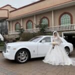 Bride on her wedding car