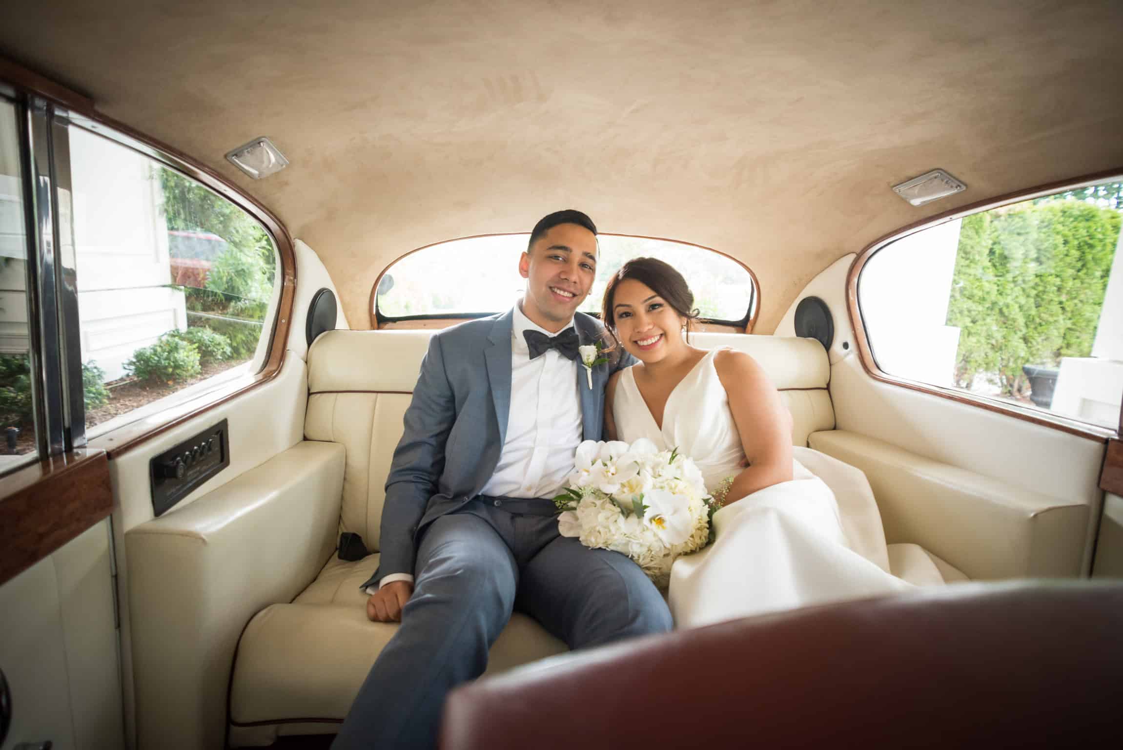 Couple inside vintage Rolls Royce limousine — wedding and anniversary limo service Glen Rock NJ Bergen County