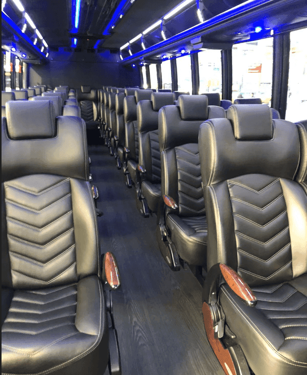 26-passenger executive mini coach interior NJ — leather seats and WiFi for wedding guest transportation