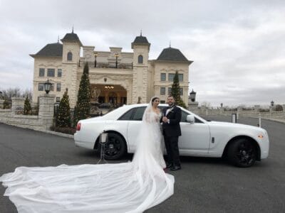 Wedding couple with Moonlight Limo Rolls Royce at Legacy Castle NJ