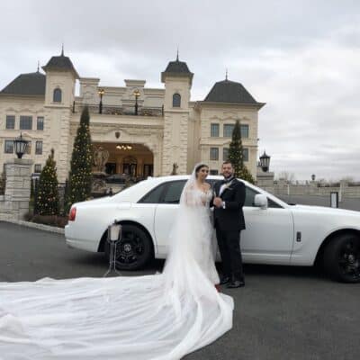 Wedding couple with Moonlight Limo Rolls Royce at Legacy Castle NJ