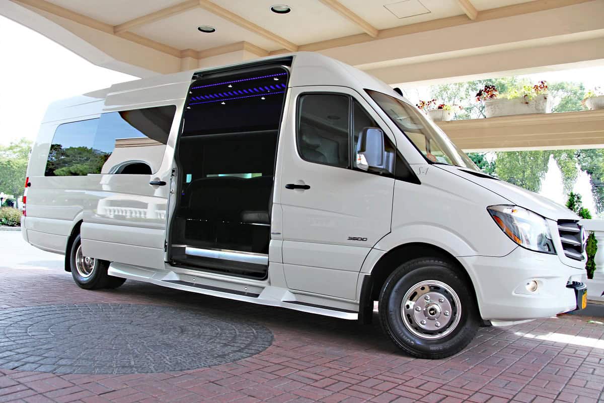 Moonlight Limo white Mercedes Sprinter for airport and corporate transportation
