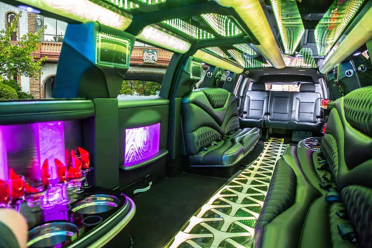 Moonlight Limo party bus interior with LED lighting and bar setup